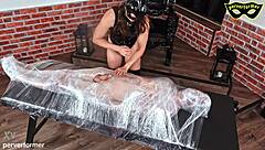 Wrapped in 100 meters of foil for total bondage control! Bound slave punished!