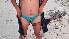Exhibiting on Mexican beach showing tits and ass in lingerie