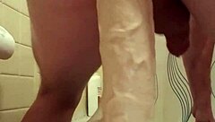 She explored self-pleasuring with extreme anal insertions using large dildos and toys in a solo session.