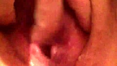 In a quiet moment, the solo girl gently explores her moist and inviting area with careful fingers