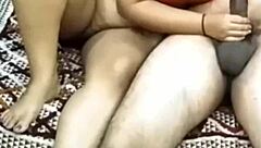 hey, check out this beautiful indian couple getting all romantic and wet in bed