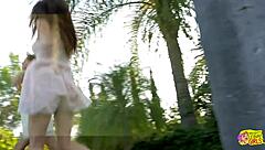 Two lesbians run through outdoor field then kiss with big clit licking masturbation and passionate pussy sex on grass