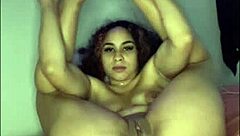 She's in the bedroom, casually stuffing her pretty tight pussy with this big black dildo until she hits that orgasm.