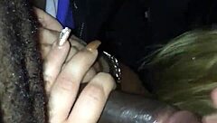 Hey, you think you can handle giving car head like this white girl does to a big black cock?