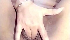 Amateur girl fingers her wet pussy in homemade video until squirting orgasm with dripping clothes ripped off