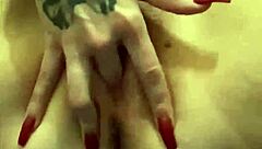 Squirting Babe Engages In Fetish Play While At Work