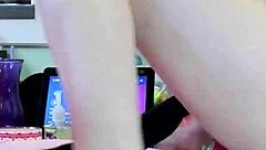 The horny wife got fisted on the kitchen counter while her husband watched in the homemade video.