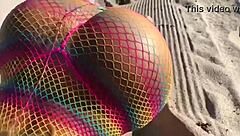 Do you want to see this beautiful blonde milf with big ass and tits on the beach?