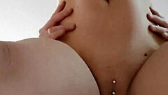 The amateur couple gets heated in the bedroom as he takes her pierced pussy from behind in intense doggystyle sex