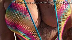 Do you want to see this beautiful blonde milf with big ass and tits on the beach?