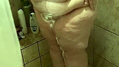 curvy bbw wife gets spotted rinsing off solo in that steamy shower setup