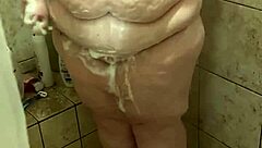 curvy bbw wife gets spotted rinsing off solo in that steamy shower setup