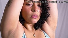 she starts her routine with careful stretches in the room focusing on colombian curves and short hair