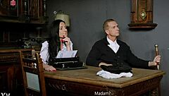 French maid Judith endures spanking and humiliation in her outfit while balancing rule book on head.