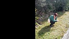 Narrative of trashy Kiwi milf pissing on roadside amid traffic in outdoor public scene