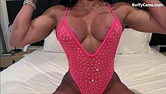 exotic female bodybuilder shows off her flexible big muscles in an athletic flexing display