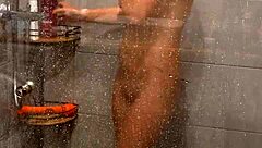 Hot milf reaches multiple magic wand orgasms in shower, blending solo fingering with blonde European moans.