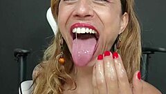 Nasty milf fists her mouth and pussy in this promo. She's a squirting Brazilian goddess with big pussy lips.