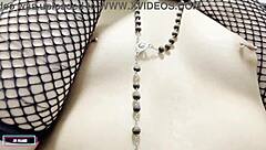 The nerdy Brazilian brunette with big clit stuffs a toy into her natural tits slut pussy.