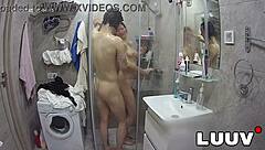 Luuv tattooed Alice joins her boyfriend in the shower while the webcam records