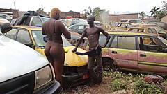 the mechanic pulls out his big cock to fuck the client hard on the car hood in the garage while people watch