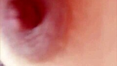 Gretala gently pinches her nipple in a moment of quiet self-exploration with big natural tits