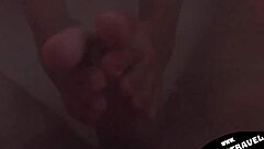 my thai girlfriend casually wraps her tight feet around my big cock for a homemade footjob session