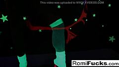 Romi starts off in the night club with a shiny disco ball nearby. Then she focuses on stuffing and toying her wet pussy solo.