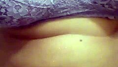 In a rural setting, the Indian milf from the village displayed her large chest during a video call.