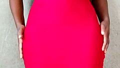 This sexy African lady teases by revealing her alluring tits