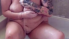 i love soaking in the tub, rubbing my big tits and shaved pussy as a mature milf slut