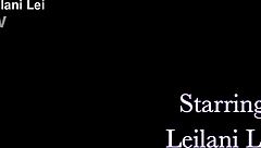 After a day at the beach, she relaxes in her bikini with tan lines showing.