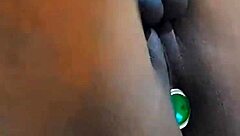 This athletic ebony shemale with a small cock strips down at home, teasing in see-through clothes before riding a dildo.