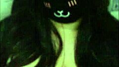 a goth girl teases her massive tits live on webcam.