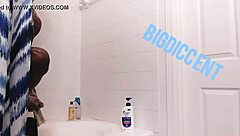 Guy strokes big dick in shower off the clock