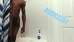Guy strokes big dick in shower off the clock