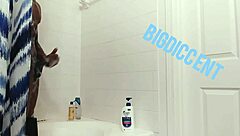 Guy strokes big dick in shower off the clock