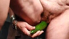 Granny fucks hairy pussy with cucumber deep