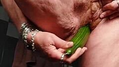 Granny fucks hairy pussy with cucumber deep