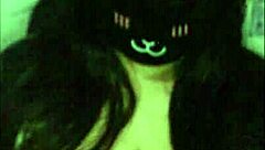 a goth girl teases her massive tits live on webcam.