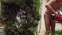 nakedman15 struts his cock flashing in the garden exhibition style