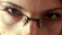 glasses-wearing karla rose kneels in pov locking eyes as she sucks my wrapped cock hungrily