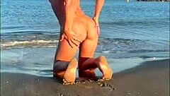 kleo furiosa shows off tight pussy and small tits on sunny beach