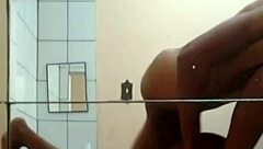 Hey, check out this muscular black couple giving brutal thrusts to her big ass in the hotel room