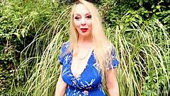 check out lucy gresty teasing her big natural tits in that garden spot