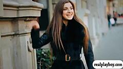 a sexy brunette babe fingers her shaved pussy moaning hard in solo play on the bed