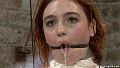 redhead lesbian slave gets bound gagged hogtied and whipped hard