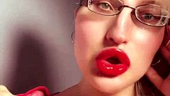 golddigger in red lip gloss glasses gives perfect lipstick fetish findom jerk off instructions for cash