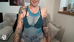 that sexy redhead teen in jeans shows off her big shaved ass and pierced nipples