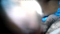 doctor examines patient closely in hospital room setting